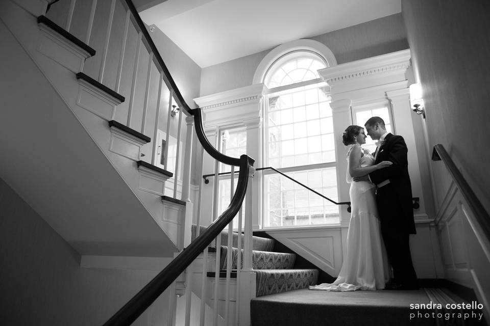 Couple's portrait on the staircase
