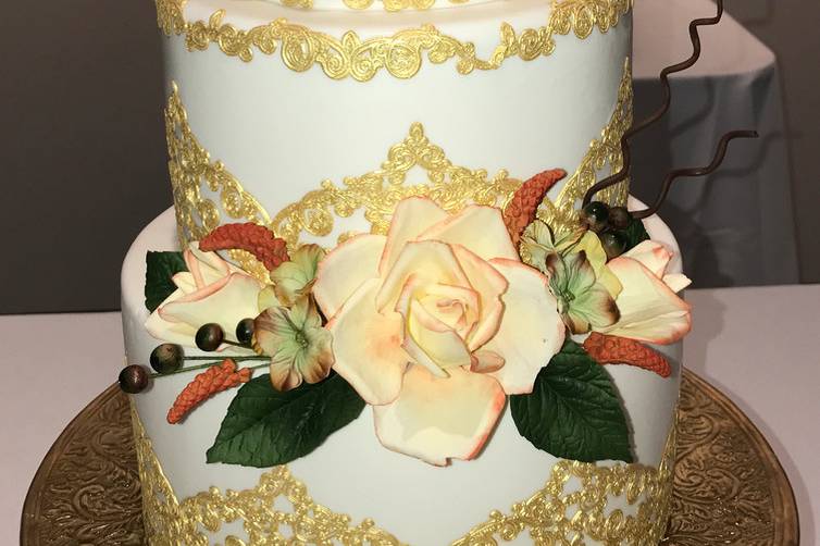 A special gold and yellow rose day. Sugar flowers lace and fondant covered