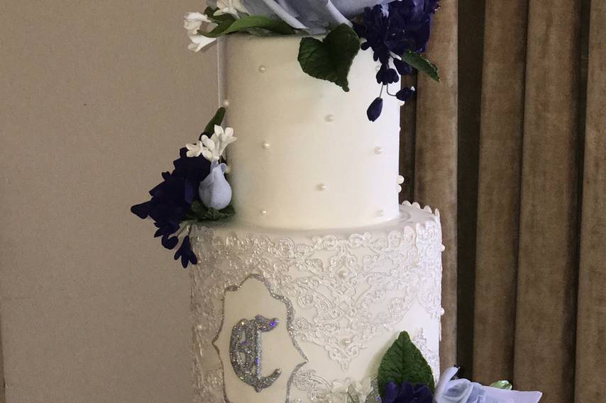 Fondant, sugar flowers and lace wedding cake