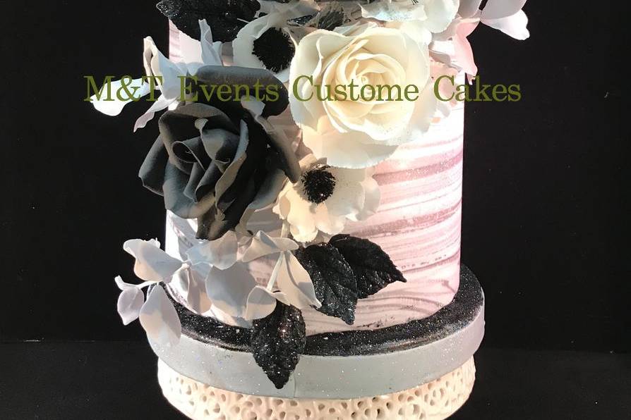 Black and white delight modern wedding cake. All edible