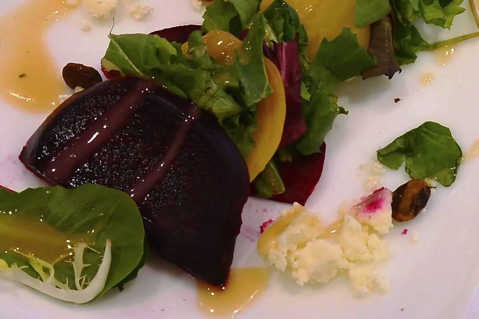 Sliced Red and Gold Beet Salad-with Baby Greens, Feta Cheese, Pistachios and a Sherry Vinaigrette