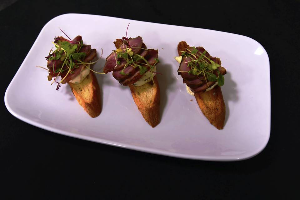 Butler-Passed Hors d'oeuvre-Coriander Encrusted Seared Duck Breast Crustini-with Herbed Goat Cheese