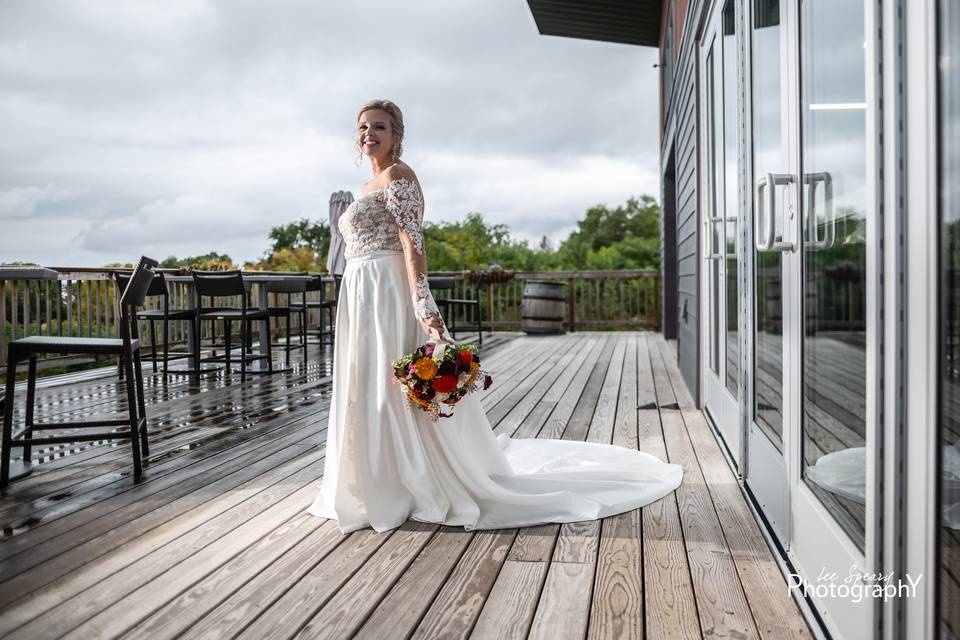 Beautiful bride on sunny deck
