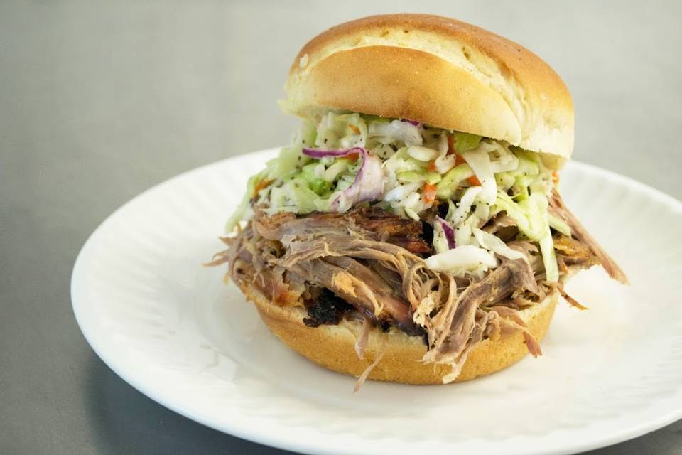 Pulled Pork topped with Cole Slaw served on a Brioche Bun.