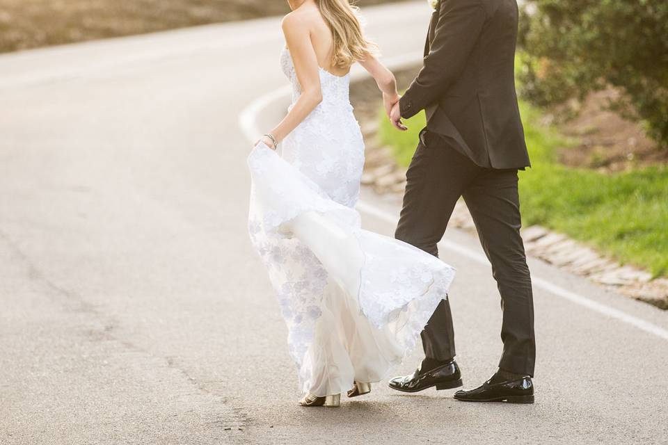 I like to get my couples to walk a bit so I can capture movement in the dress and hair