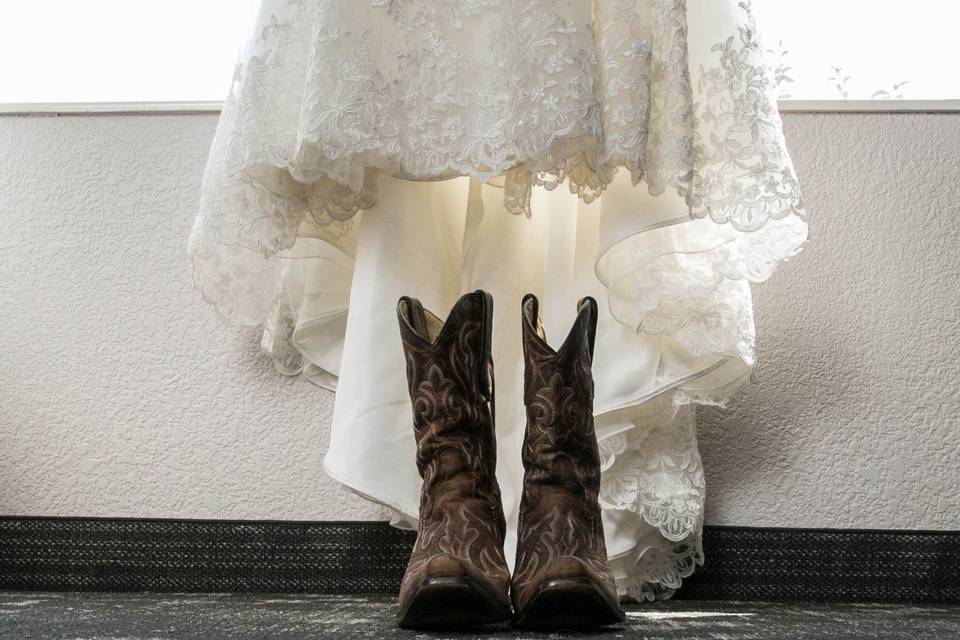 Wedding prep boots and dress