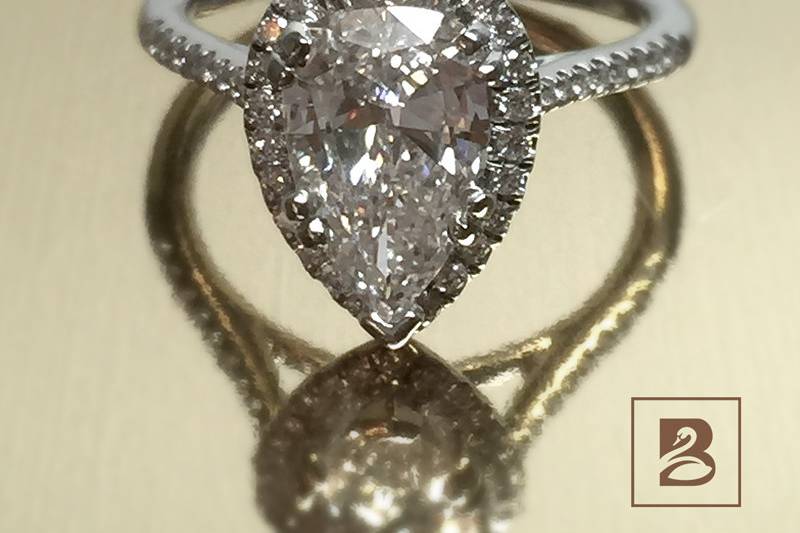 Pear shaped single stone ring