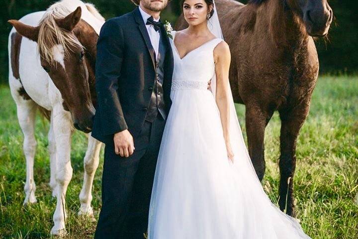 Newlyweds with the horses