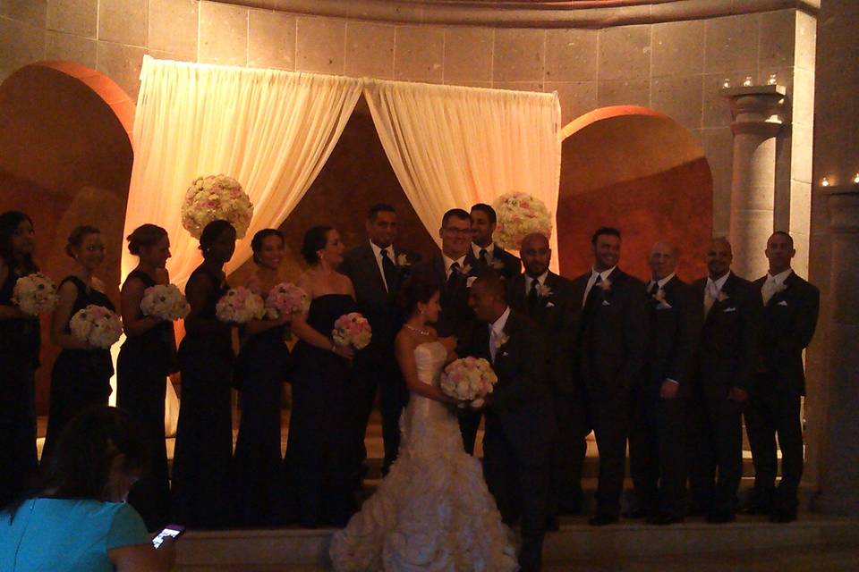 Newlyweds with bridesmaids and groomsmen