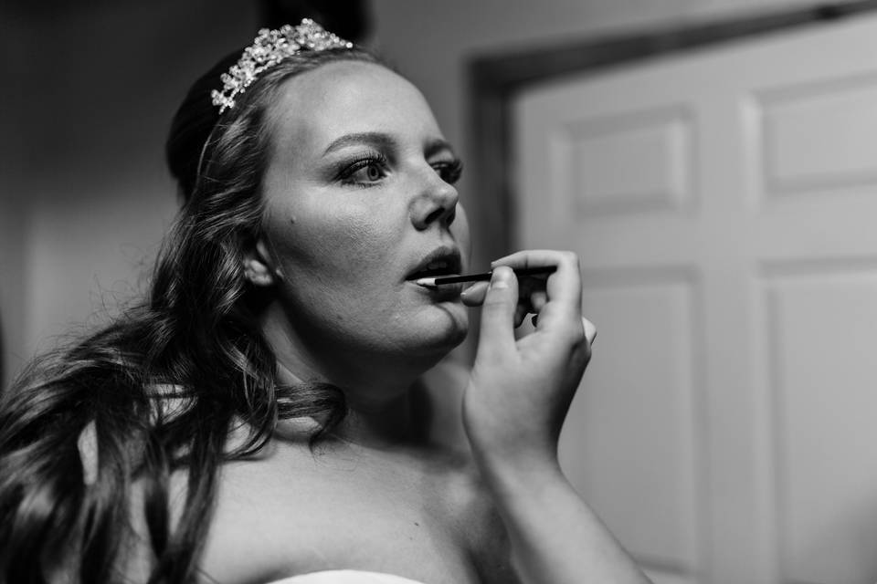 Bride during hair and makeup