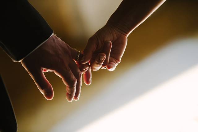 Couple's holding hands