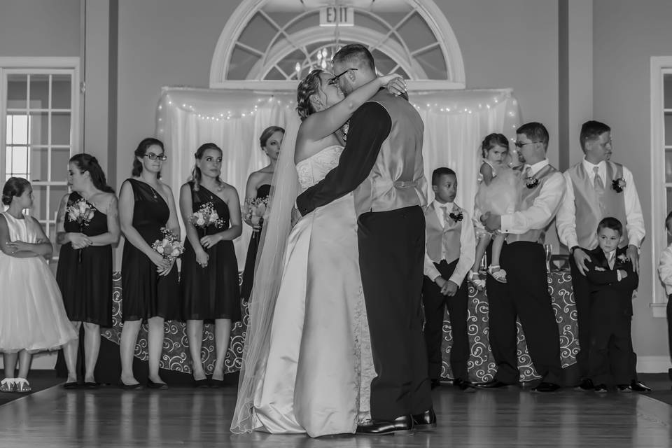 Andy and Jess enjoying their first dance together. This image may not be reproduced without the expressed written consent of Donnie Dahlen Photography.