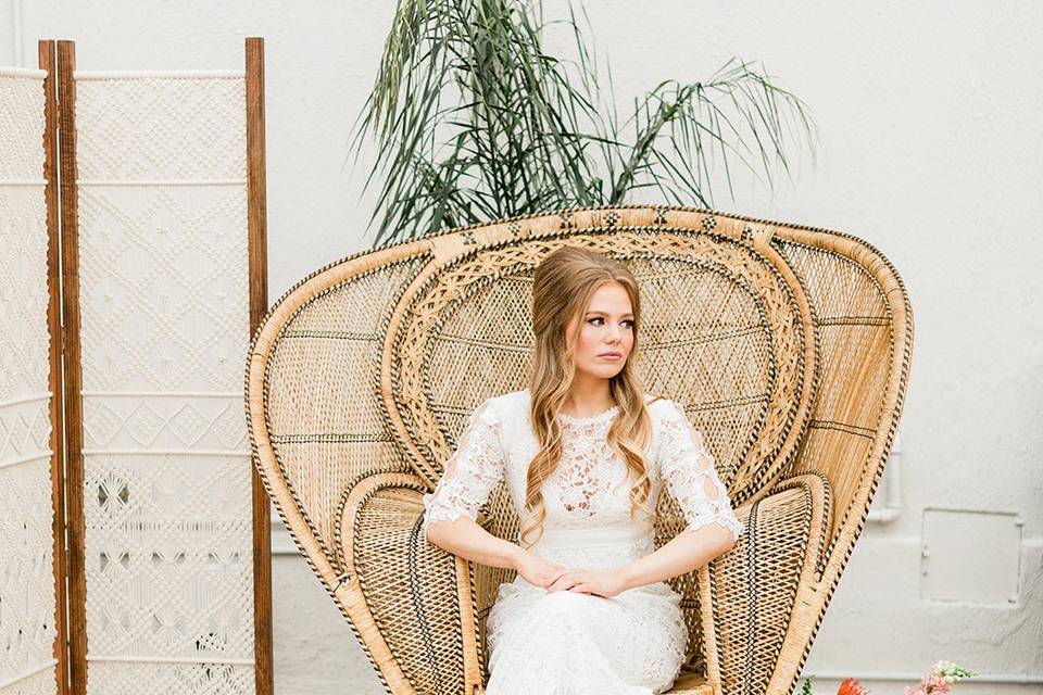 Bride relaxing in chair