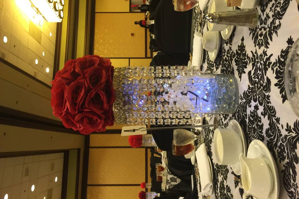 Crystal chandelier with pomander ball centerpiece