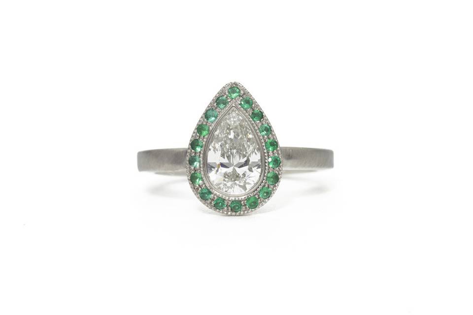Custom diamond and emerald engagement ring