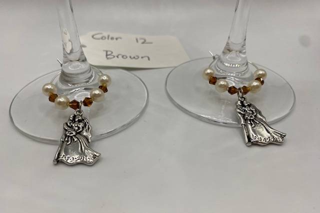 Brown jeweled toasting charms