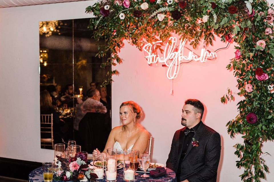 Sweetheart table & neon sign