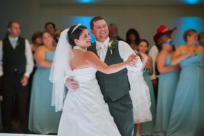 Astro Entertainment can provide a modern LED Dance Floor.  The Floor can be set to thousands of color combinations, pulsate and more.  For the first dance, a white setting to match the theme