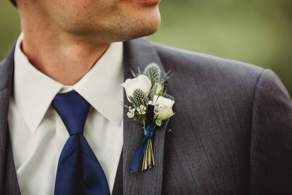 Boutonniere with blue thistle