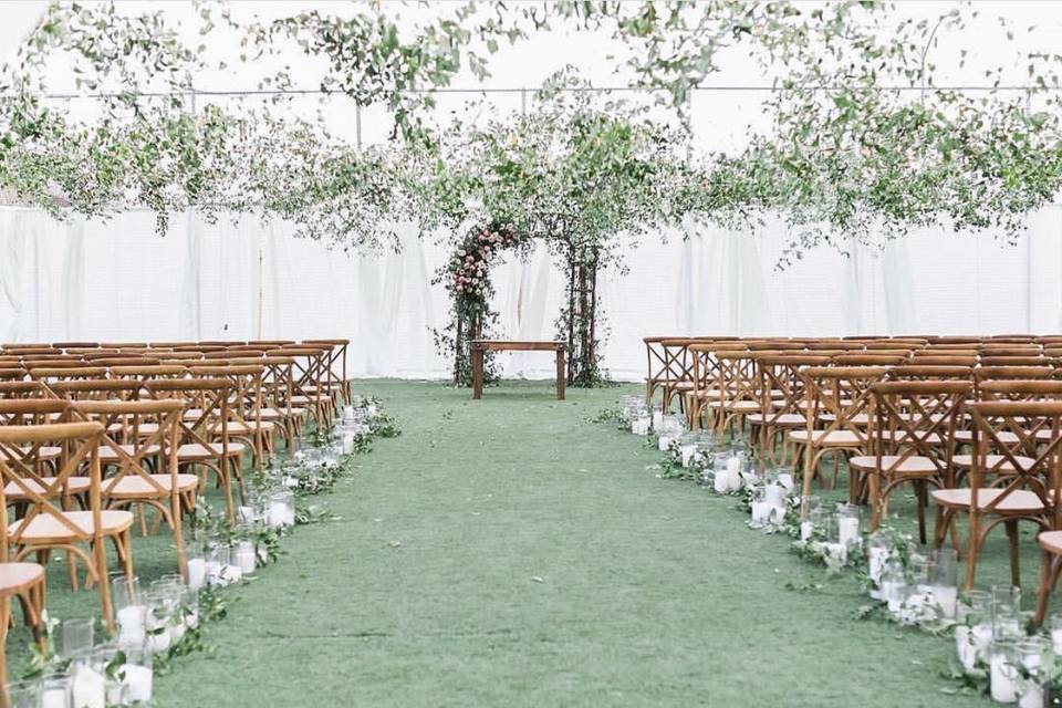 Wooden chairs and arch