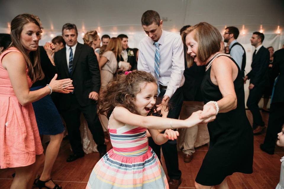 Packed Dance Floor at a backyard tent wedding in Nashua NH | Photo Credit LKH Photography