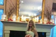 Ashleigh in front of the decorated Mantle