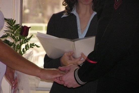 Couples often hold hands during the vows.
