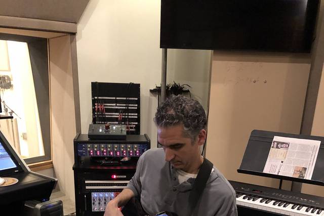 John overdubbing bass