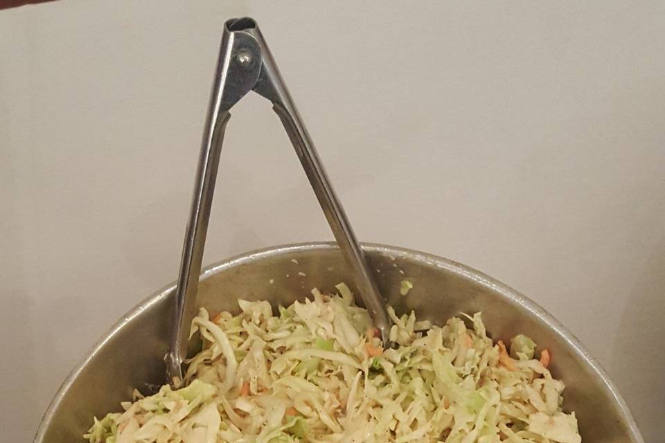 Coleslaw brings a taste of familiar family gatherings to any wedding.