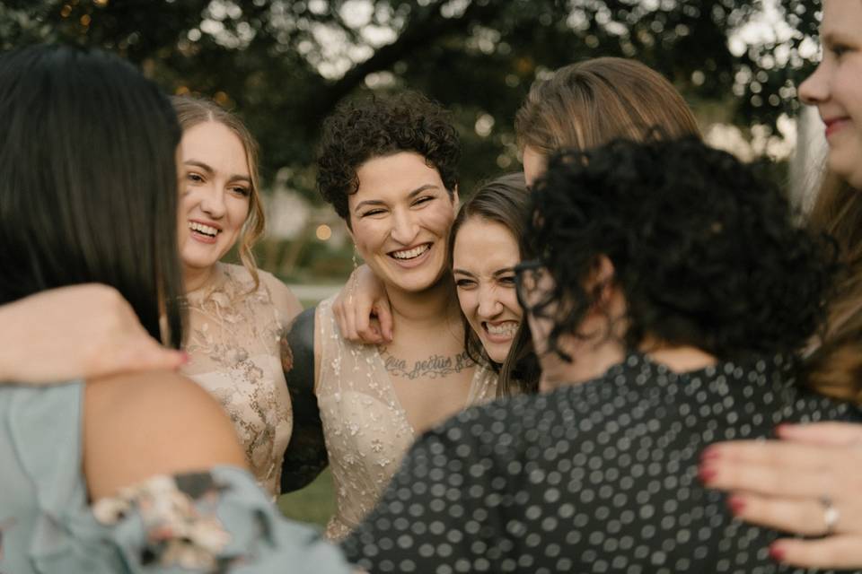 Wedding day group hugs