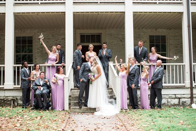 The couple with the bridesmaids and groomsmen