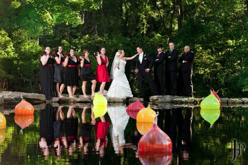 The couple with the bridesmaids and groomsmen