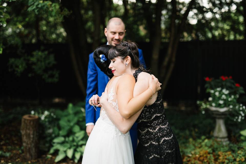 Hugging the beautiful bride