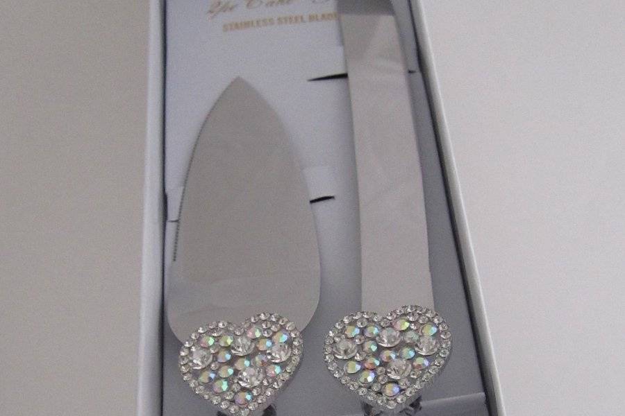 Hearts  Desire  cake  server  set -  $23.95  per  setFaux  crystal  stainless  steel  cake  server  set  hand  decorated  with  rhinestone  hearts.The  hearts  desire  cake  server  set  sparkles &  shines  with  love!