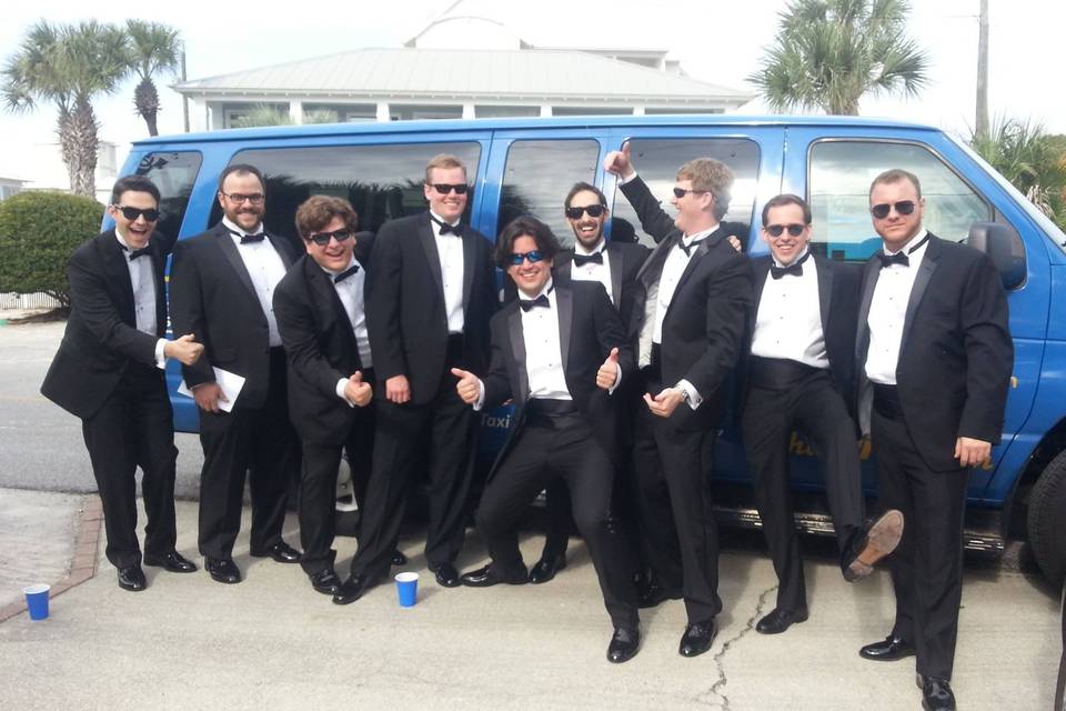 Groom and his groomsmen outside the van