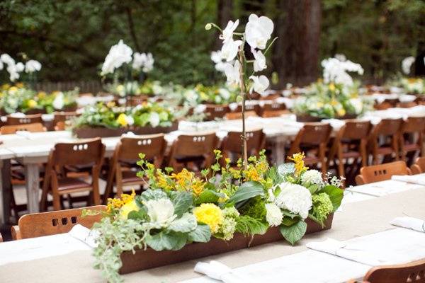 Long tables with garden rustic centerpieces