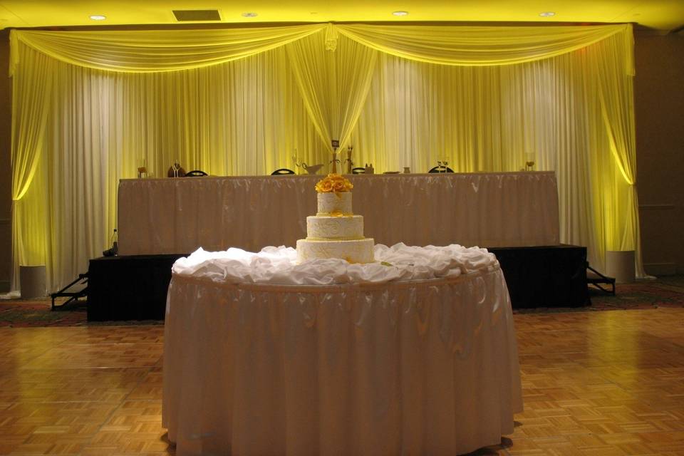 Cake decorated with delicate yellow flowers