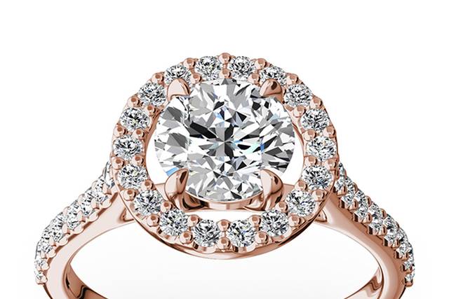 ENR9367Timeless halo engagement ring with micro pave setting will put her heart on fire. This the most popular design engagement ring surrounds you choice of round center diamond with smaller diamonds total of 0.50 ct. tw. This ring is available in 14k, 18k, platinum and palladium.