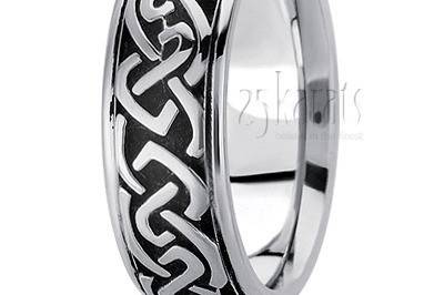 A masterpiece! This 10mm wide Celtic wedding band is a great example of lovely Celtic art. It's complete with step edges. This wedding band is also available in 11, 12mm. The band is high polished.