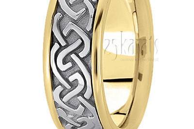 A stylish design, this 8.5mm wide Celtic wedding ring has an embossed center motif. This wedding band is also available in 7.5, 9.5, 10.5mm. The band is high polished.