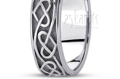 A true symbol of love, this 7mm wide Celtic wedding ring has symmetrical heart knots all around. This wedding band is also available in 8, 9, 10mm. The band is high polished.