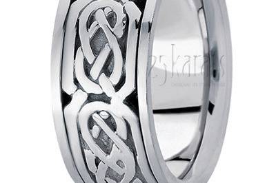 A bestseller, this 10mm wide Celtic wedding band has a flat body, complete with flat edges. This wedding band is also available in 11, 12mm, and Two color Gold. The band is high polished.