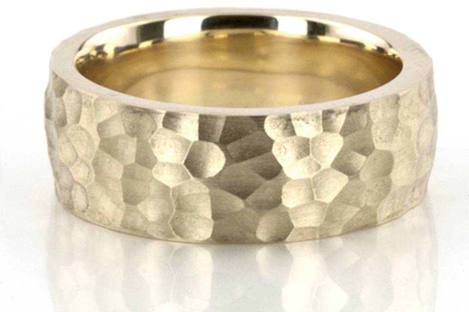 This 5mm wide wedding ring is simple and elegant with a hammer finish. This band is also available in 6, 7, 8mm.