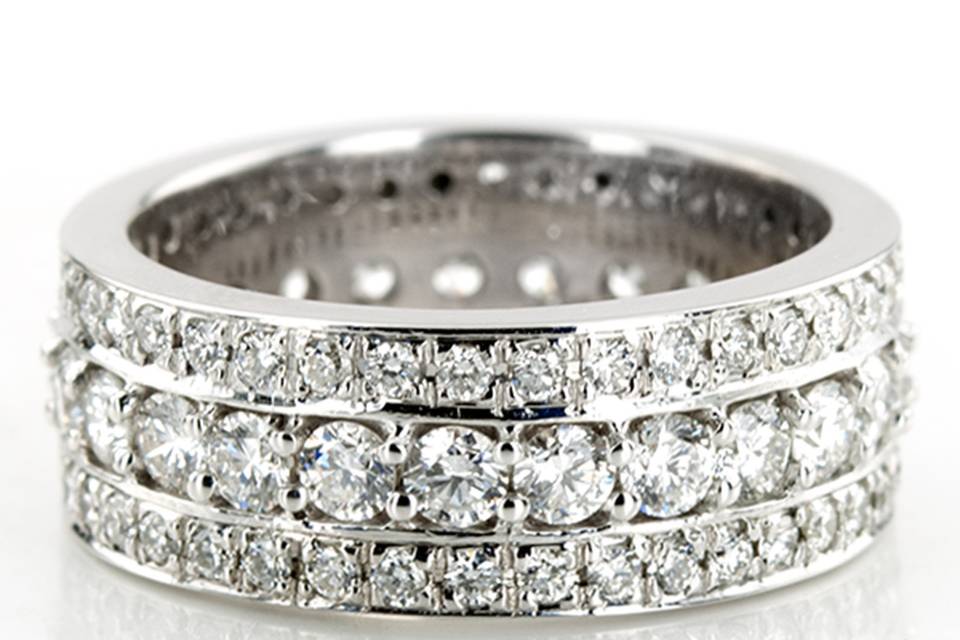 Chic. This channel set fancy diamond eternity wedding band is set with 101 round cut diamonds for ring size 6. The total weight of the diamonds is 2.01 ct.tw. This eternity wedding band is available in white gold, yellow gold, platinum or palladium.