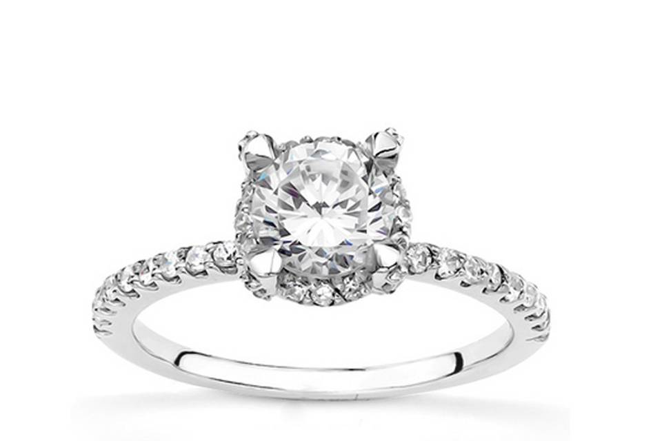 ENR8422This elegant diamond engagement ring set in contemporary shared prong style. This engagement ring furnished with diamonds on its prong for enhancing look. This stunning engagement ring features 0.34ct. tw. GH SI1,2 diamonds and available in 14k, 18k, platinum and palladium.