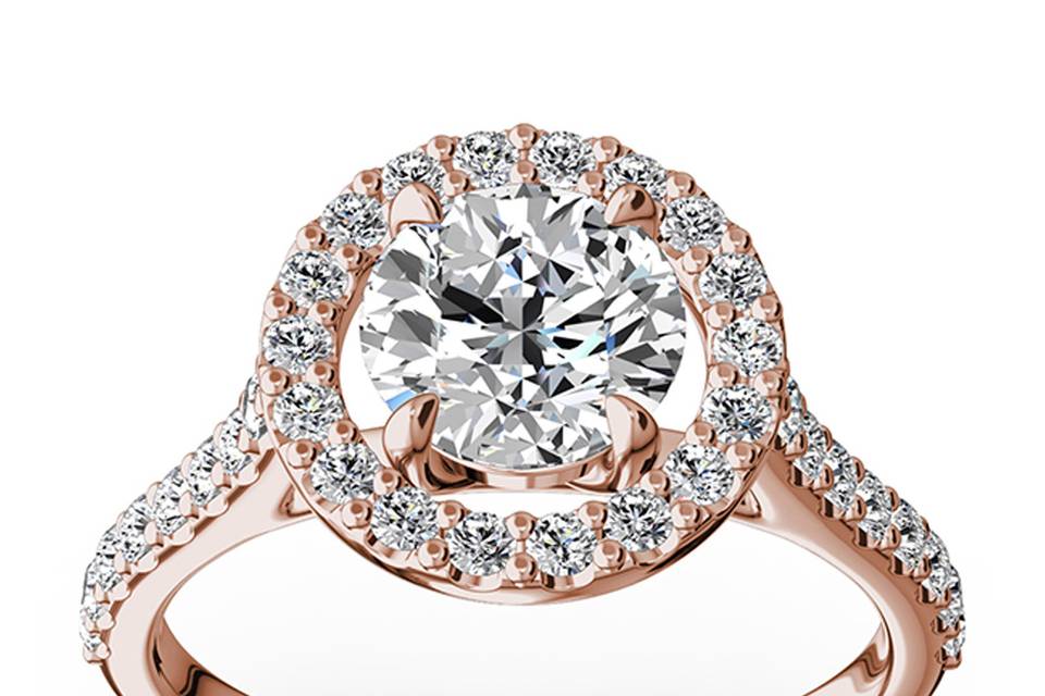 ENR9367Timeless halo engagement ring with micro pave setting will put her heart on fire. This the most popular design engagement ring surrounds you choice of round center diamond with smaller diamonds total of 0.50 ct. tw. This ring is available in 14k, 18k, platinum and palladium.