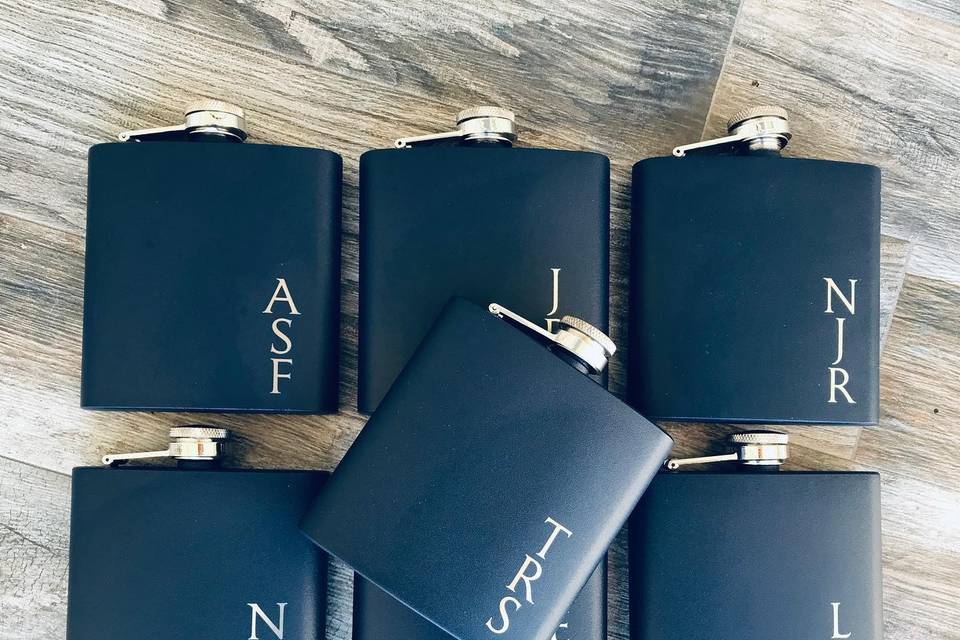 Laser-engraved hip flasks