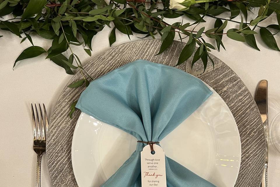 Teal and wood place setting