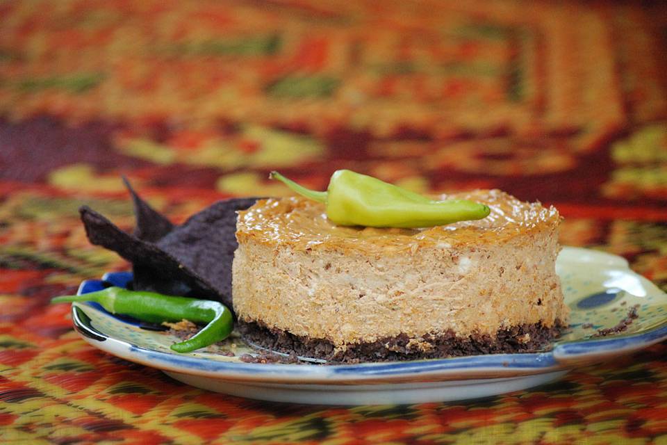 Chipotle cheese torte with blue corn chip crust.