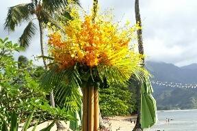 6' TALL BAMBOO STRUCTURE- ASSORTED PROTEAS, LARGE OBAKE ANTHURIUMS, YELLOW MAKARA & ONCICIDUM ORCHID SPRAYS